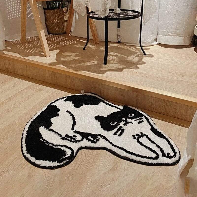 https://www.dormvibes.com/cdn/shop/products/adorable-cat-shaped-crochet-tufted-rug-thick-anti-slip-absorbent-mat-for-bathrooms-kitchens-and-room-entrances-848772.jpg?v=1690643946